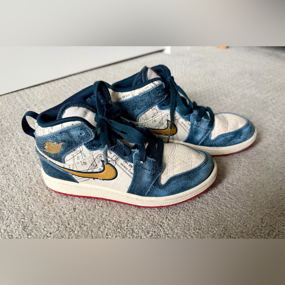 Nike Blue and White High-Top Sneakers with Gold Accents